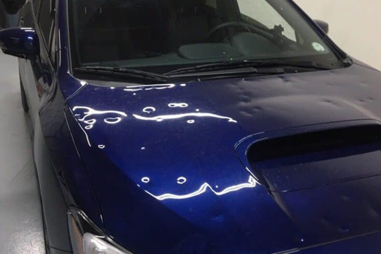 blog-hail-damage-blue-car - Rocky Mountain Dent Service Rocky Mountain Dent Services in Denver Colorado